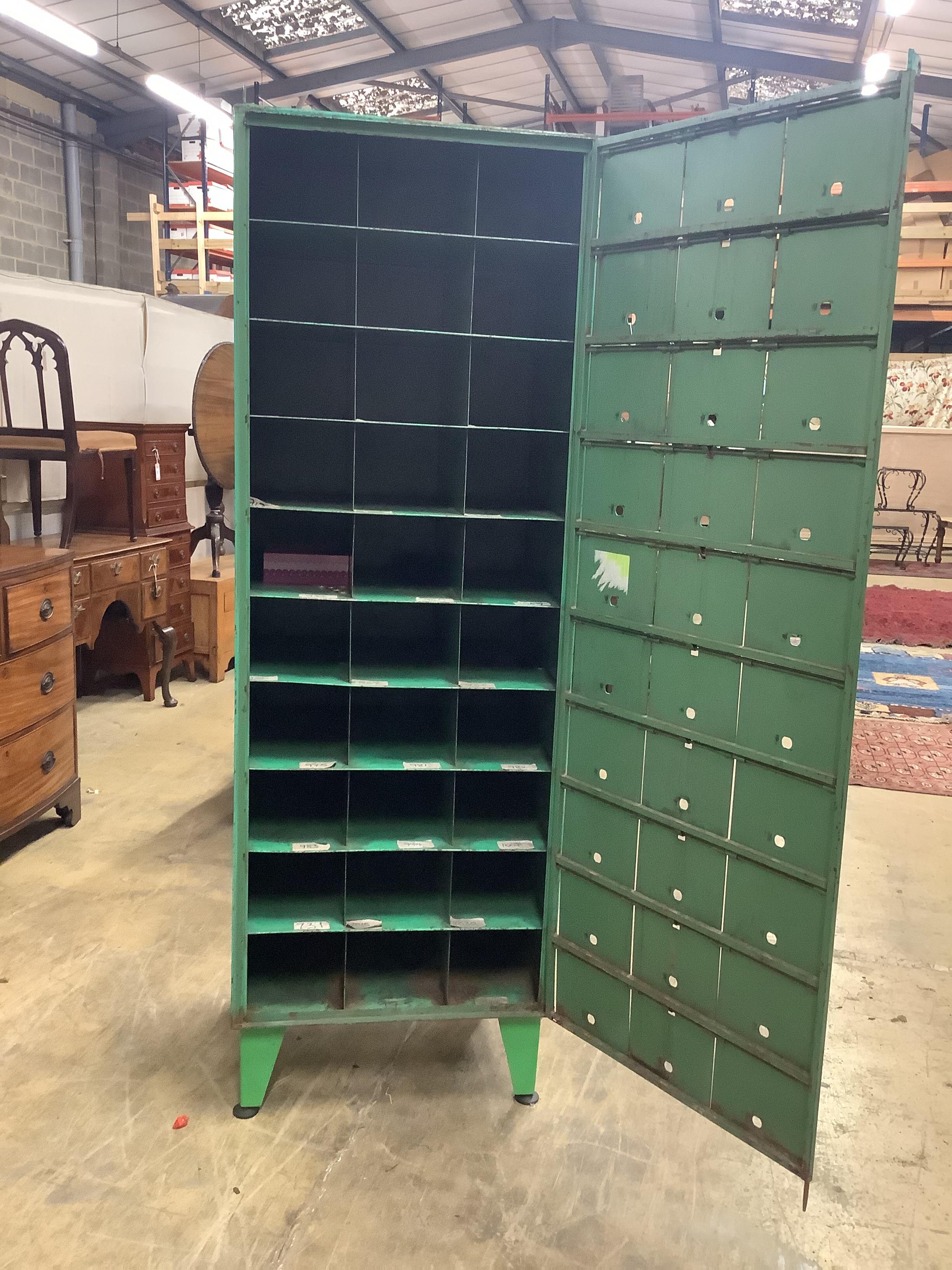 An industrial style painted metal locker, width 61cm, depth 51cm, height 182cm
